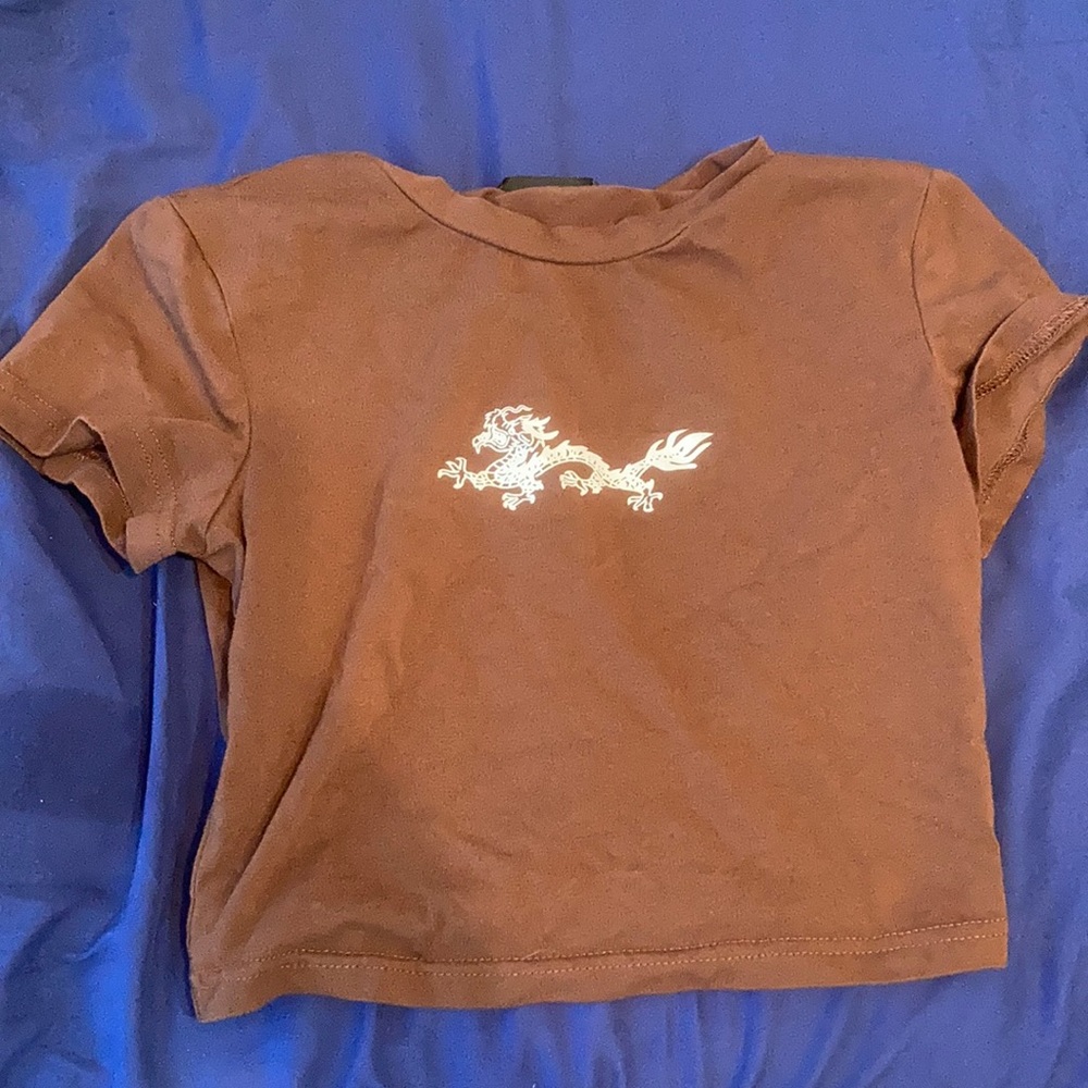 3-$10❤️❤️ brown dragon baby tee